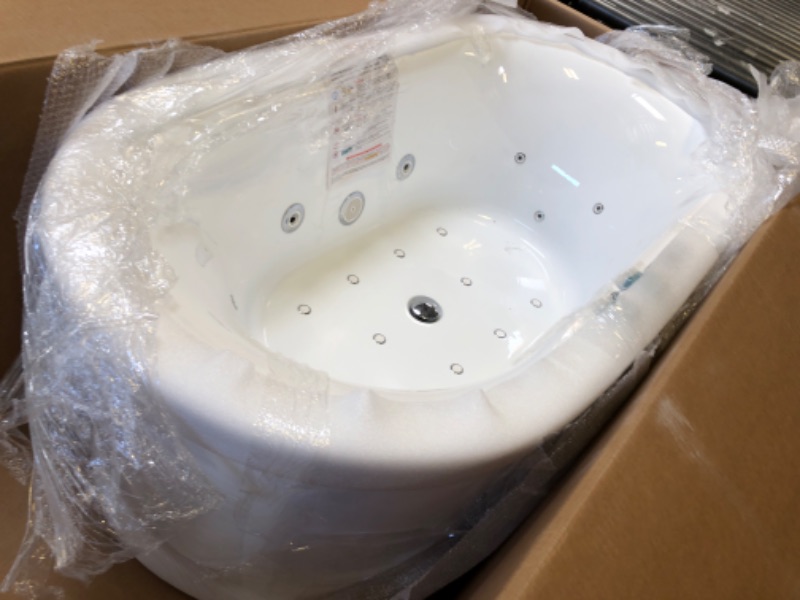 Photo 1 of WOODBRIDGE 59" x 31-1/2" Whirlpool Water Jetted and Air Bubble Freestanding Heated Soaking Combination Bathtub with LED control panel,BJ-100