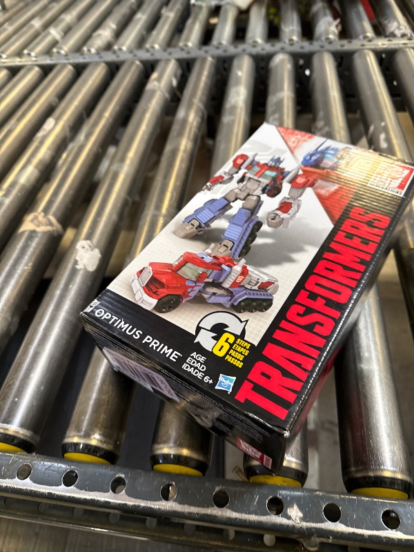 Photo 1 of Transformers Toys Heroic Optimus Prime Action Figure - Timeless Large-Scale Figure, Changes into Toy Truck - Toys for Kids 6 and Up, 11-inch (Amazon Exclusive)
