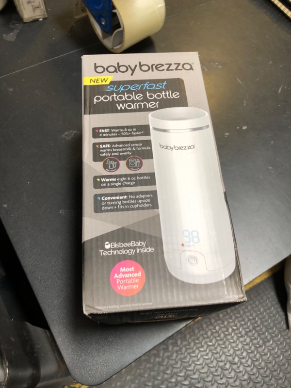 Photo 1 of Baby Brezza Superfast Portable Baby Bottle Warmer – 50% Faster - Travel Breastmilk Warmer and Formula Warmer - Safe, Even Heating - Up to 9oz - No Adapters, White