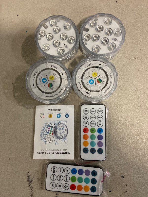 Photo 1 of Creatrek Pool Lights with Remote, 10 Color Changing Pool Lights for Above Ground Pools, Battery Operated Submersible LED Lights for Pond, Bathtub, Hot Tub, Party, 4 Pack
