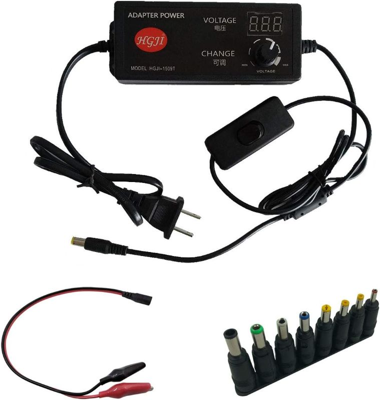 Photo 1 of AC-DC Adapter, HGJI AC-DC Switching Power Supply Charger Adjustable 100-240V to 3.3-24.7V 2.5A 50-60hz 60W with LED Voltage display US plug+Control Switch+8pcs Conversion Head+DC Alligator Clip Cable