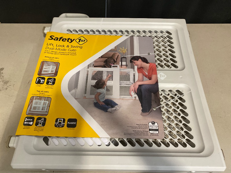 Photo 1 of Safety 1st Baby Gates for Doorways, Pressure Mount Lift, Lock and Swing, Dog Gates, Hardware Gate for Stairs, Fits 28"-42" Wide