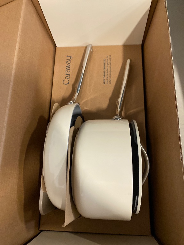 Photo 1 of Caraway Mini Cookware Set - Non-Stick Ceramic Fry Pan (1.05 qt, 8") Sauce Pan (1.75 qt) & Storage Rack - Non Toxic, PTFE & PFOA Free - Oven Safe & Stovetop Agnostic (Gas, Electric & Induction) - Cream
