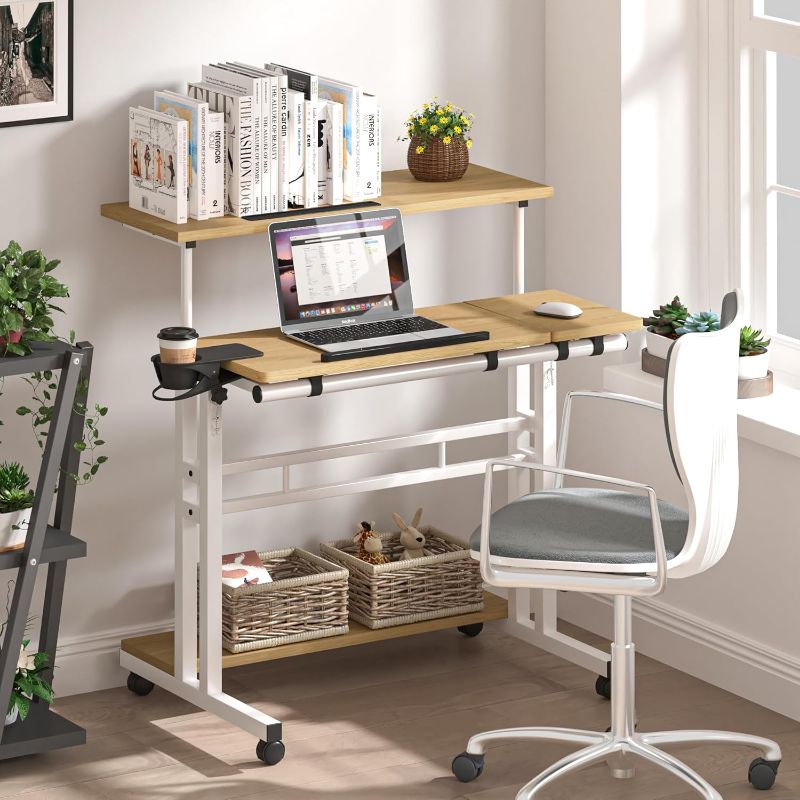 Photo 1 of Mobile Standing Desk, Adjustable Rolling Computer Desk with 3 Desktops, Portable Laptop Table with Cup Holder, Home Office Laptop Workstation on Lockable Wheels,Khaki