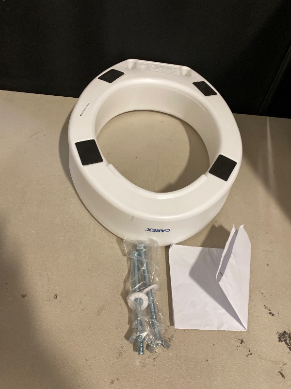 Photo 1 of Carex Toilet Seat Riser, Elongated Raised Toilet Seat Adds 3.5 inches to Toilet Height, for Assistance Bending or Sitting, 300 Pound Weight Capacity Toilet Riser