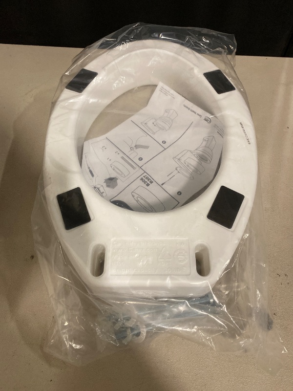 Photo 1 of Carex Toilet Seat Riser, Elongated Raised Toilet Seat Adds 3.5 inches to Toilet Height, for Assistance Bending or Sitting, 300 Pound Weight Capacity Toilet Riser