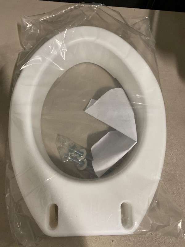 Photo 1 of Carex Toilet Seat Riser, Elongated Raised Toilet Seat Adds 3.5 inches to Toilet Height, for Assistance Bending or Sitting, 300 Pound Weight Capacity Toilet Riser