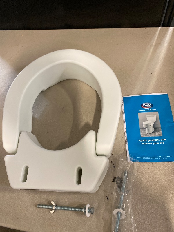 Photo 1 of Carex Hinged Raised Toilet Riser, Elongated