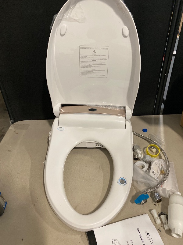 Photo 1 of LEIVI Smart Bidet Toilet Seat with Wireless Remote and Side Panel, Multiple Spray Modes, Adjustable Heated Seat, Warm Water and Air Dryer, Auto LED Nightlight, Elongated