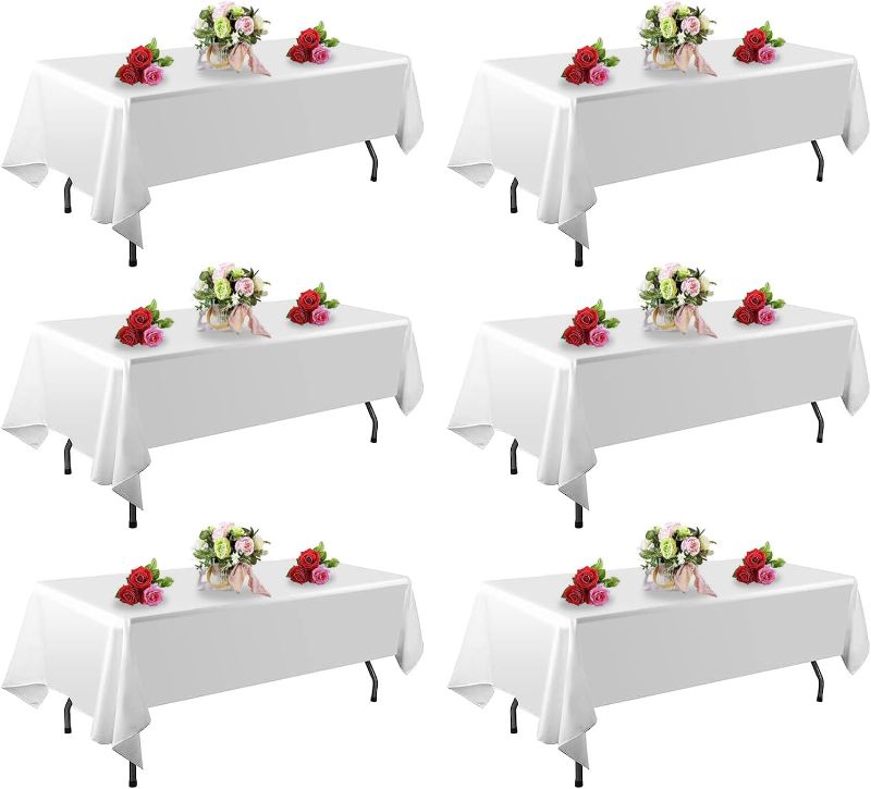 Photo 1 of FINDYOU 6 Pack White Rectangle Tablecloths - 60 x 102 Inch, Stain and Winkle Resistant Polyester, Washable, Perfect for 6 Foot Tables, Parties, Wedding, Dining