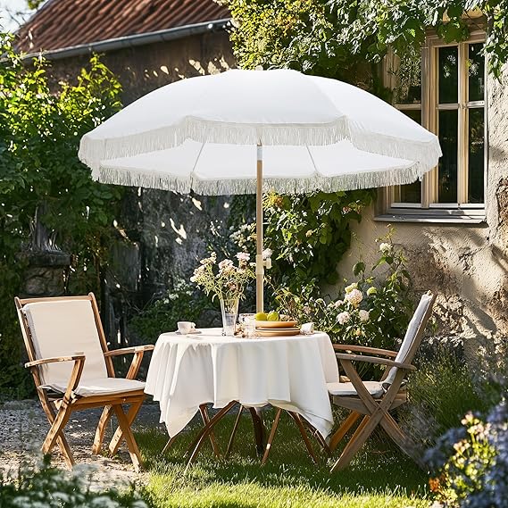 Photo 1 of Patio Umbrella with UPF 50+ Protection, 8 Ribs, Push Button Tilt - Versatile Outdoor Shade for Garden, Courtyard, and Beach