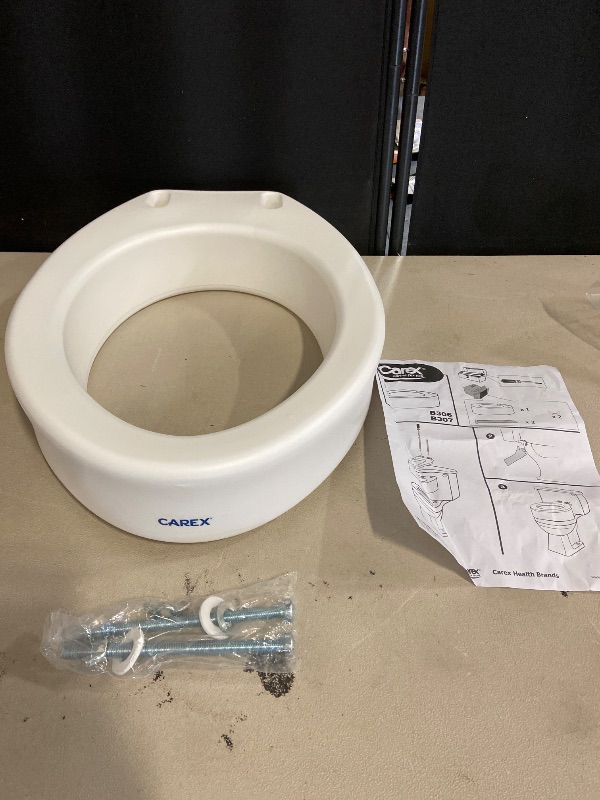 Photo 1 of Carex Toilet Seat Riser, Elongated Raised Toilet Seat Adds 3.5 inches to Toilet Height, for Assistance Bending or Sitting, 300 Pound Weight Capacity Toilet Riser
