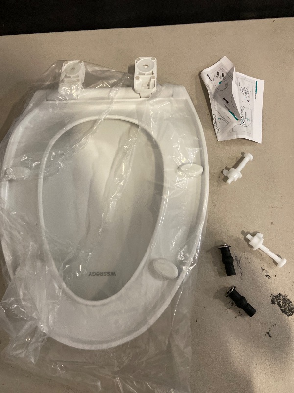 Photo 1 of Toilet seat Elongated with Slow Close Hinges, Four Bumpers Never Loosen and Easily Remove, Two Sets of Parts, Plastic, White