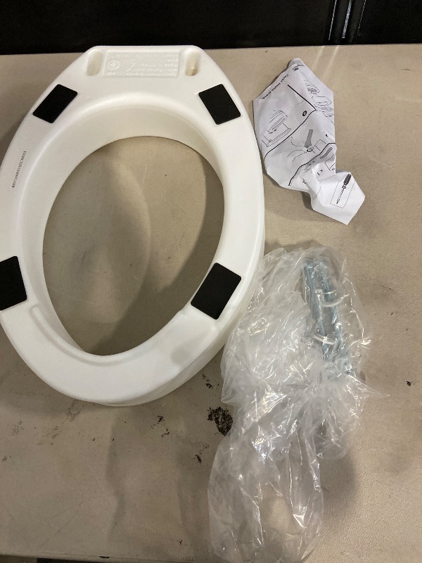 Photo 1 of Carex Toilet Seat Riser With Quick-Lock, Raised Toilet Seat Adds 4 Inches of Height to Toilet - Toilet Seat Lifter With 300 Pound Weight Capacity, Slip-Resistant