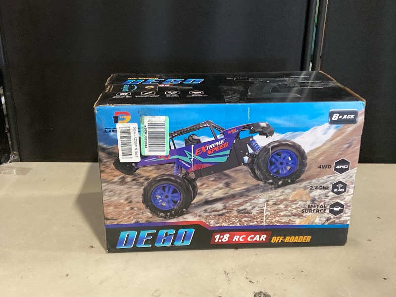 Photo 1 of DEERC Large 1:8 Scale Upgraded Monster Truck Remote Control Car for Adults Boys, Off Road RC Cars with Realistic Sound, 2.4Ghz 4WD Rock Crawler Toy All Terrain Climbing, 2 Batteries for 80 Min Play