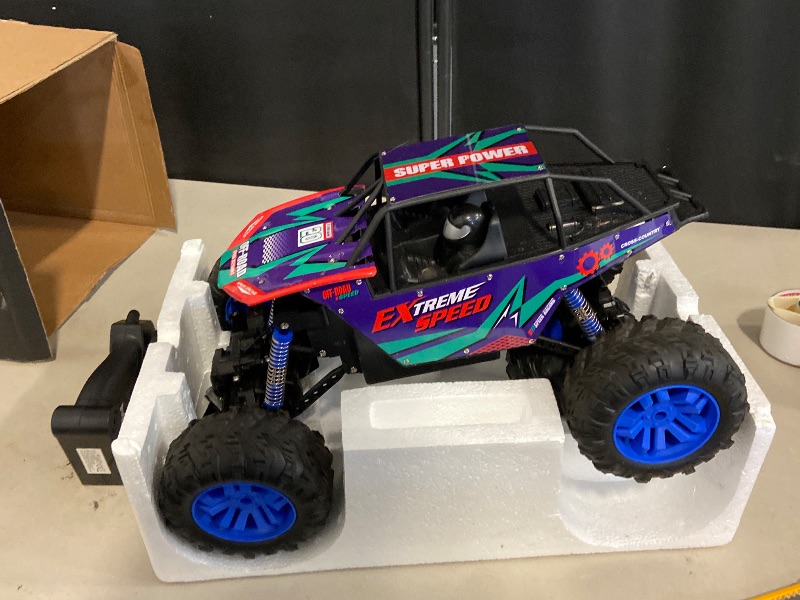 Photo 1 of DEERC Large 1:8 Scale Upgraded Monster Truck Remote Control Car for Adults Boys, Off Road RC Cars with Realistic Sound, 2.4Ghz 4WD Rock Crawler Toy All Terrain Climbing, 2 Batteries for 80 Min Play