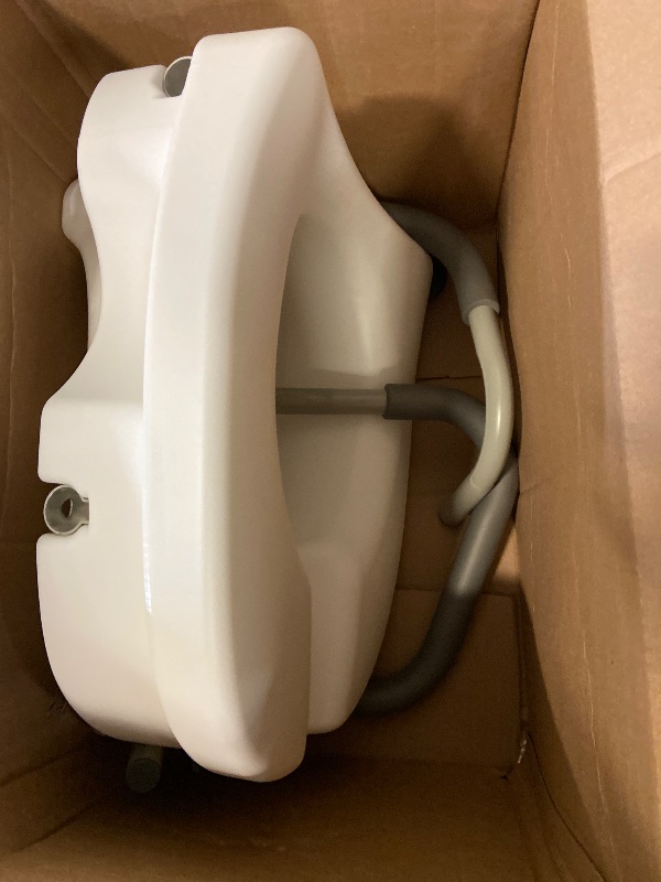 Photo 1 of Drive Medical RTL12027RA 2-in-1 Raised Toilet Seat with Removable Padded Arms, Standard Seat