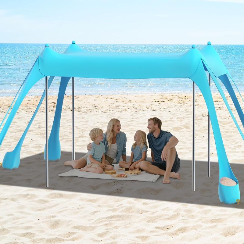 Photo 1 of DOLLATE Beach Tent (Light Green), 10x10ft Beach Sunshade, Camping Sun Shade UPF50+ with 8 Sandbags, Sand Shovel, Ground Spikes and Stabilizer Poles, Beach Tent for Camping, Backyard Entertainment