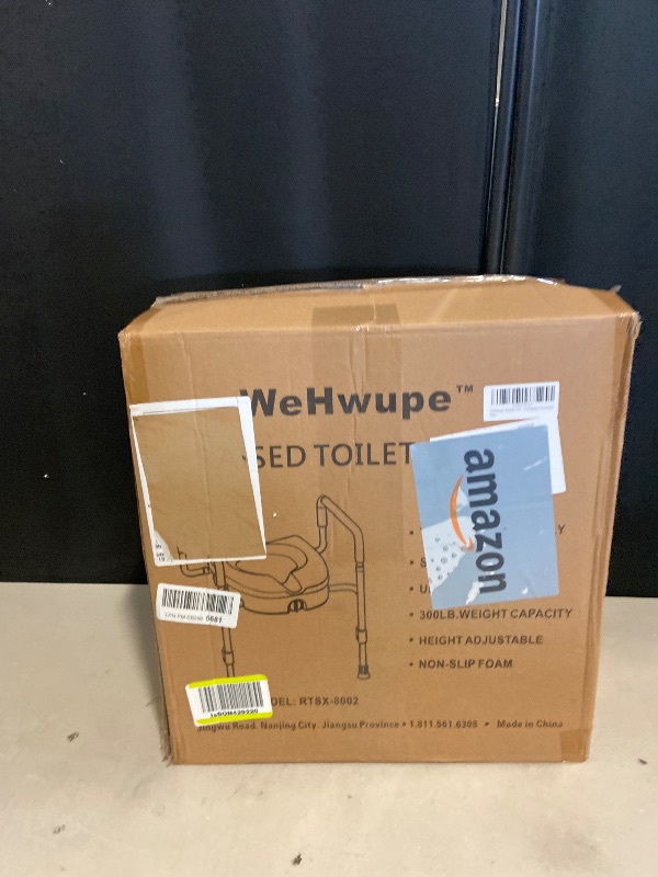 Photo 1 of Drive Medical RTL12027RA 2-in-1 Raised Toilet Seat with Removable Padded Arms, Standard Seat