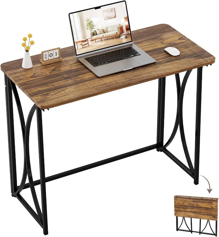 Photo 1 of Folding Desk, 31.5" Small Desk for Bedroom, Space Saving Foldable Computer Desk for Home Office, Easy Assembly, Brown