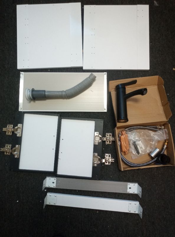 Photo 1 of Bathroom/Kitchen Faucet and accessories ( Black Faucet, supply lines, drain, cabinets and shelves)