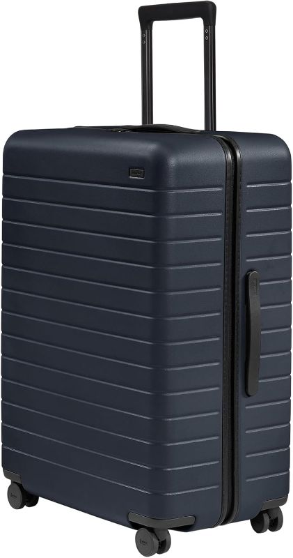 Photo 1 of Away Large Checked Luggage, 29 Inch Hardside Suitcase with Spinner Wheels, Lightweight & Durable, TSA Lock, Navy Blue