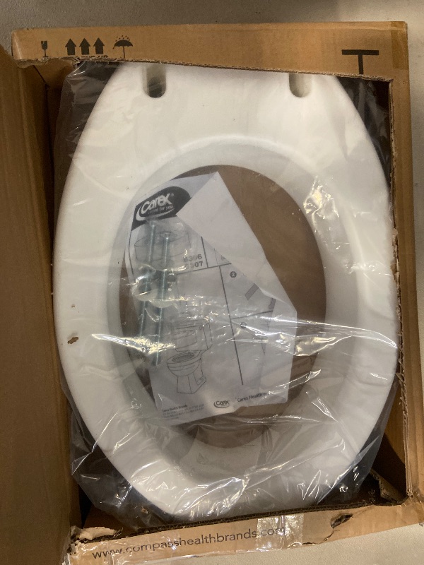 Photo 1 of Carex Toilet Seat Riser, Elongated Raised Toilet Seat Adds 3.5 inches to Toilet Height, for Assistance Bending or Sitting, 300 Pound Weight Capacity Toilet Riser