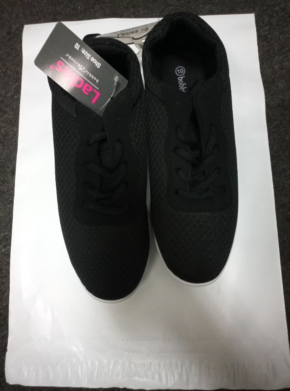 Photo 1 of Size 10 Black Ladies lace up tennis shoes