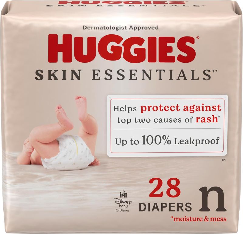 Photo 1 of Huggies Size Newborn Diapers, Skin Essentials Baby Diapers, Size Newborn (6-9 lbs), 28 Count, Packaging May Vary