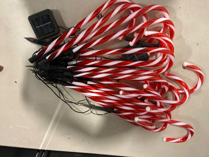 Photo 1 of Biswing Christmas Outdoor Candy Cane Lights, 12 Pcs Christmas Pathway Markers with 72 Count Warm White Lights, Connectable for Indoor Outdoor Holiday Walkway Patio Garden Ornament
