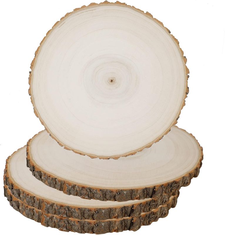 Photo 1 of Prsildan 4 Pack Large Wood Circle Slices, 8 to 10 Inches DIY Unfinished Wood Table Centerpieces, Natural Rustic Round Crafts for Indoor Christmas Wedding Party Décor