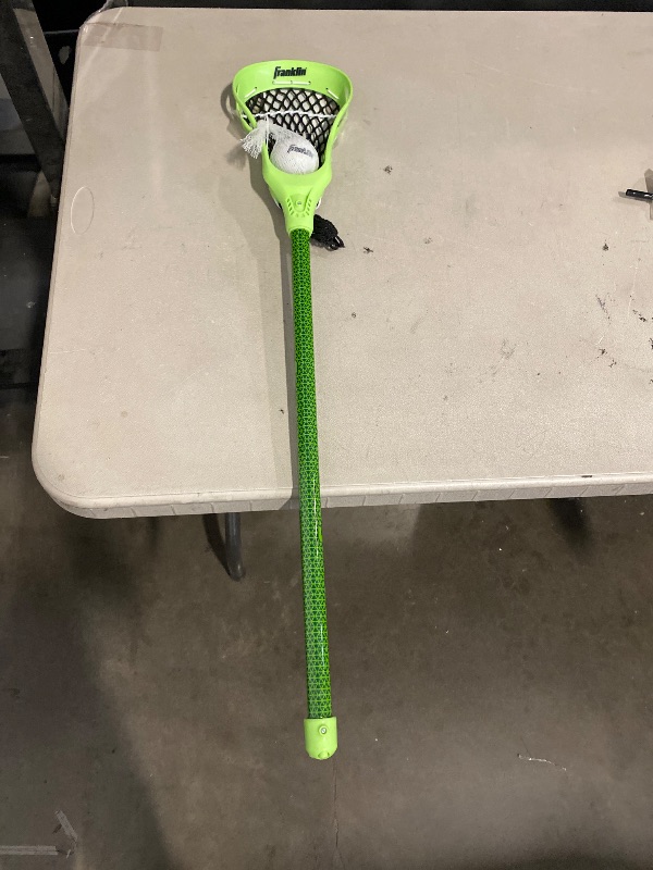 Photo 1 of Franklin Sports Future Champs Youth Lacrosse Stick + Ball Set - Kids 32" Inch Practice Stick - Beginner Backyard Plastic Stick + Lightweight Soft Ball