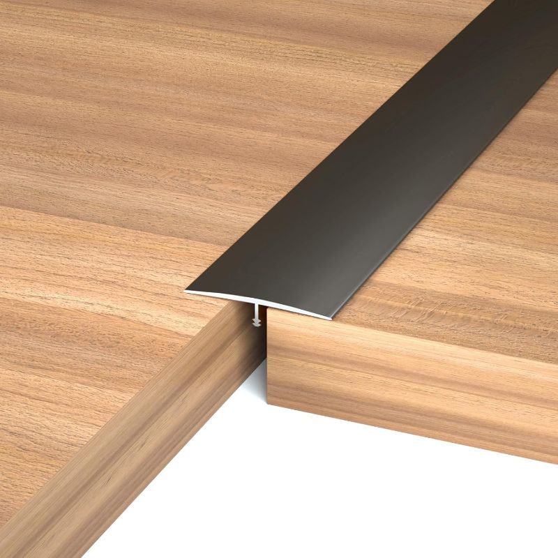 Photo 1 of NeatiEase T Molding Floor Transition Strip, Aluminum Laminate Floor Strip Floor Flat Divider Strip for Joining Floor Gaps, Threshold, Floor Tiles, Black, 4ft x 1.6in (3pcs