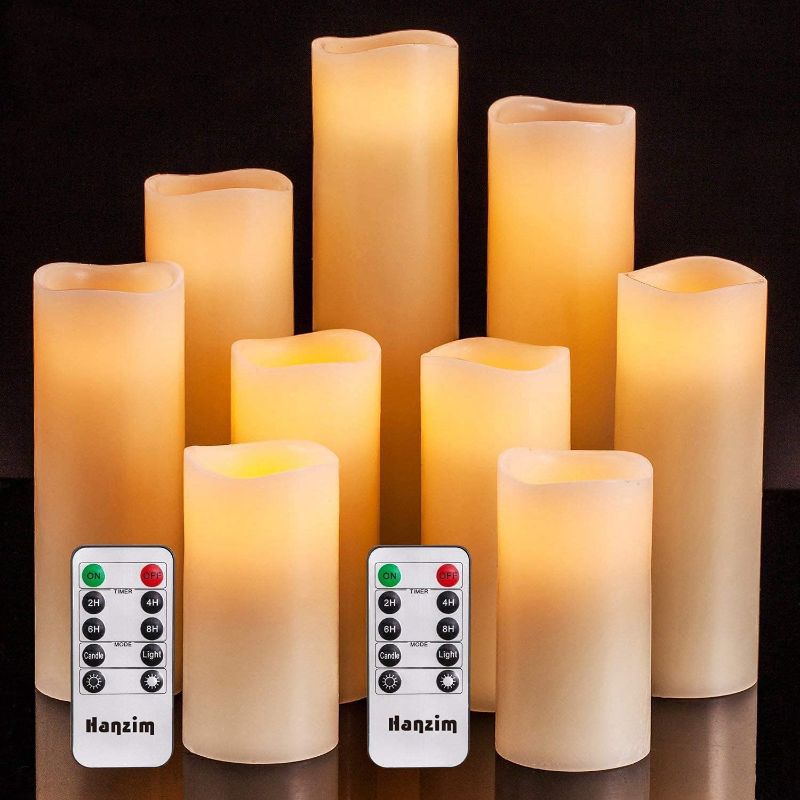 Photo 1 of Flameless Flickering Battery Operated Candles D2.2''*H4 5" 6" 7" 8" 9" Set of 9 Ivory Real Wax Pillar LED Candles with 10-Key Remote and Cycling 24 Hours Timer (Ivory)