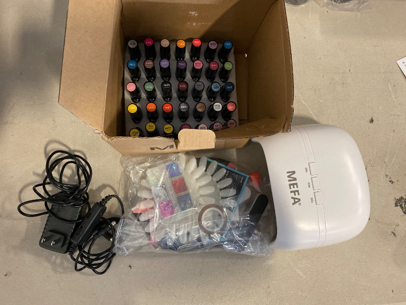 Photo 1 of MEFA Gel Nail Polish Kit with U V Light, 32 Colors All Seasons Soak Off 60 Pcs Gel Polish Nail Set with Matte/Glossy Glitter Base Top Coat Manicure Tools Nails DIY Decorations Gifts for Women