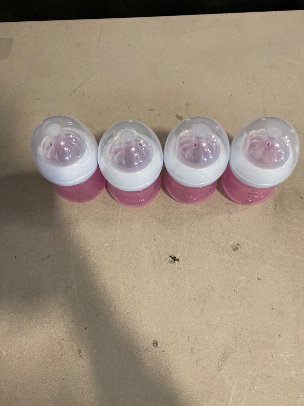 Photo 1 of Philips Avent Natural Baby Bottles with Natural Response Nipples (Slow Flow, Flow 2), 4oz, Pink, 4-Pack, SCY900/14