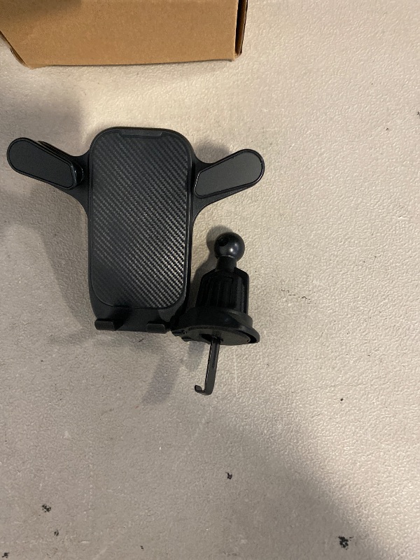 Photo 1 of Car Phone Mount - Ultimate Multi-Functional Gravity Car Vent Phone Holder for Secure Navigation and Superior Convenience