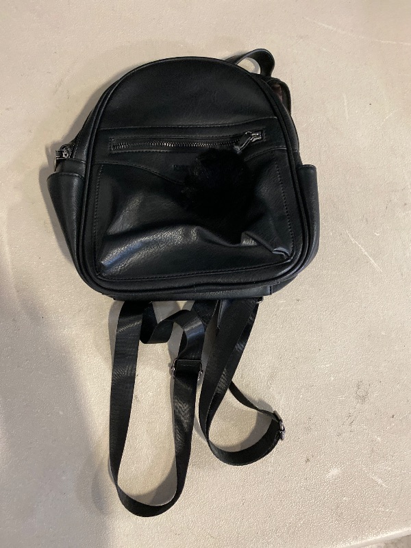 Photo 1 of IHAYNER Mini Backpack Purse for Girls Teens Women Purses PU Leather Pom Backpack Shoulder Bag with Charm Tassel