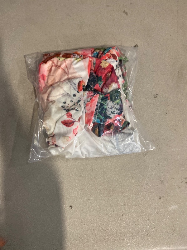 Photo 1 of Size 4XL Woman’s Plus Floral Top 