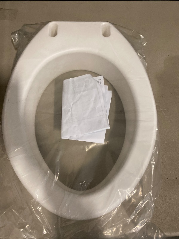 Photo 1 of Carex Toilet Seat Riser, Elongated Raised Toilet Seat Adds 3.5 inches to Toilet Height, for Assistance Bending or Sitting, 300 Pound Weight Capacity Toilet Riser
