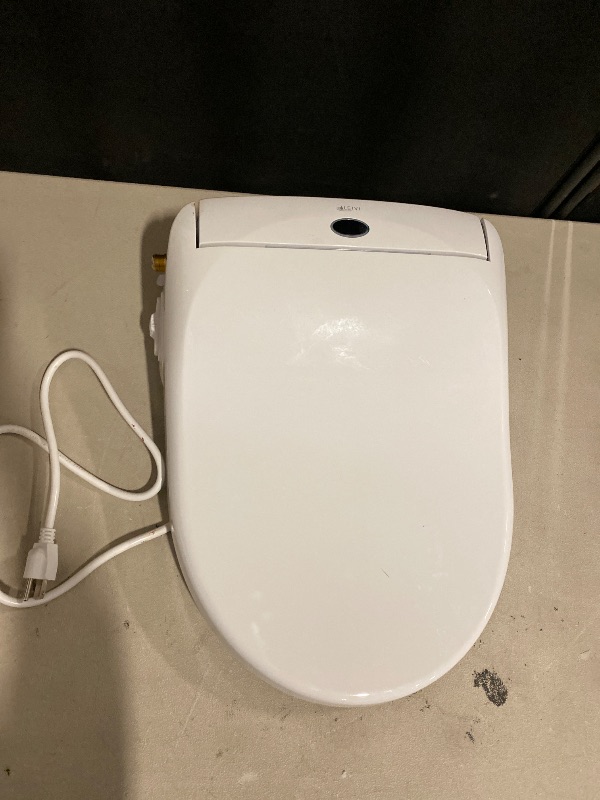 Photo 1 of LEIVI Electric Bidet Toilet Seat with Wireless Remote and Side Panel, Multiple Spray Modes, Adjustable Heated Seat, Warm Water and Air Dryer, Auto LED Nightlight, Round