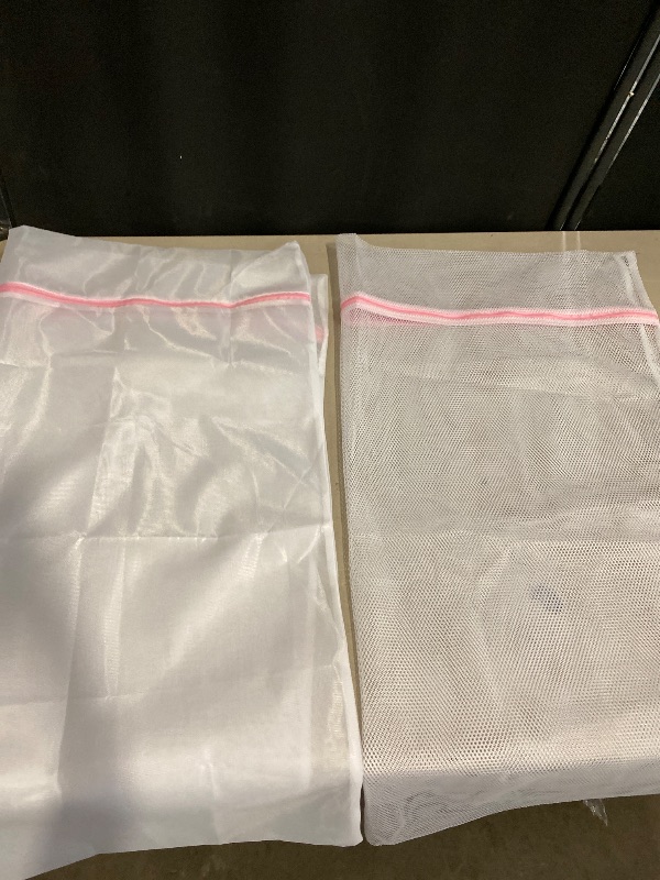 Photo 1 of Extra Large Mesh Laundry Bags Washing Bag 2Pack Delicates Bag and Zipper Laundry Bag Jumbo for Washing Machine Large Mesh Bags for Blankets, Bedding, Coats, Toys (2PCS-XXXL)