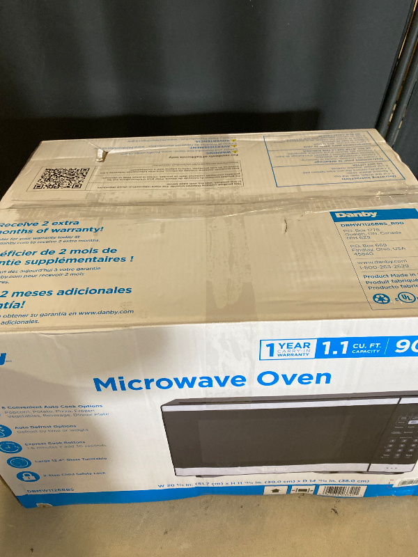 Photo 1 of Danby DBMW1126BBS 1.1 cu. ft Countertop Microwave, Black and Stainless Steel