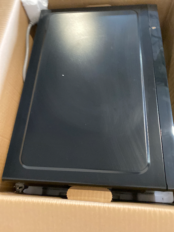 Photo 1 of Danby DBMW1126BBS 1.1 cu. ft Countertop Microwave, Black and Stainless Steel