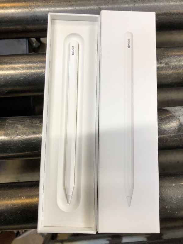 Photo 1 of Apple Pencil (2nd Generation): Device Compatibility Check Required - Pixel-Perfect Precision, Perfect for Note-Taking, Drawing, and Signing documents. Attaches, Charges, and Pairs magnetically.