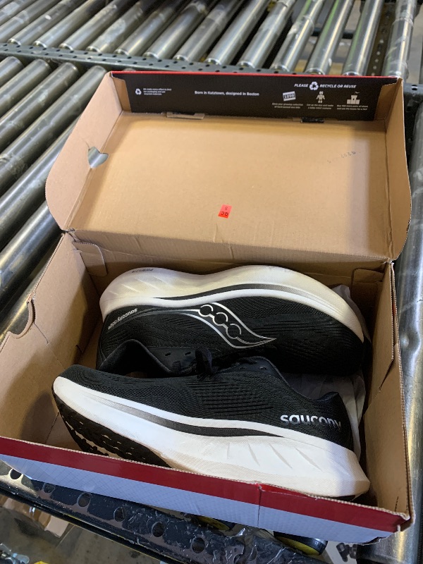 Photo 1 of Saucony Women's Ride 18 Sneaker, Black/White, 7.5 Wide