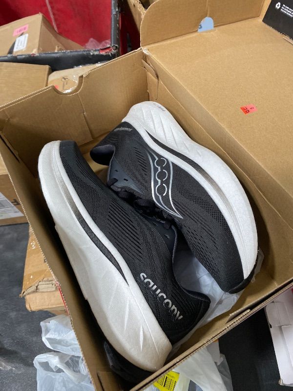 Photo 1 of Saucony Women's Ride 18 Sneaker, Black/White, 7.5 Wide