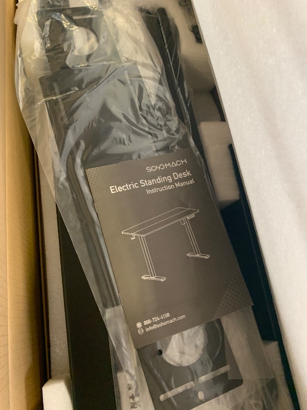 Photo 1 of SHW 55 x 28 Inches Electric Height Adjustable Standing Desk with Drawer and Memory Preset, Black