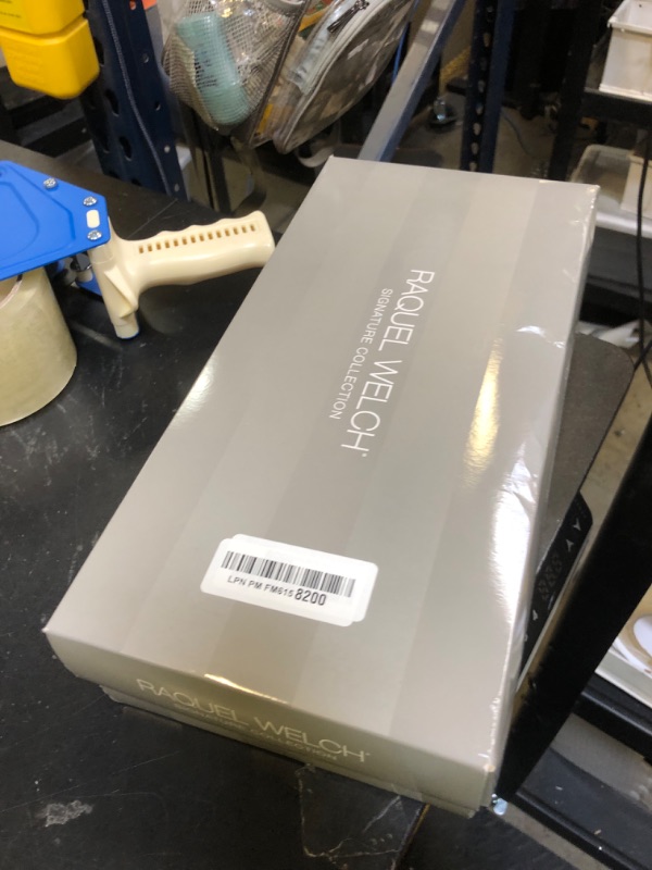 Photo 1 of Raquel Welch Big Spender Shoulder Length Pageboy Wig With Sophisticated Tumbled Waves by Hairuwear, Average Size Cap, Pink