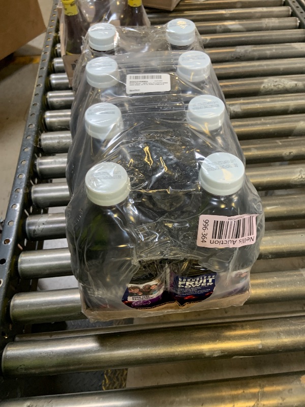 Photo 1 of ***EXPIRE 2/13/26*** Ocean Spray® 100% Juice Cranberry Grape Juice Blend, 64 Fl Oz Bottle (Pack of 8)